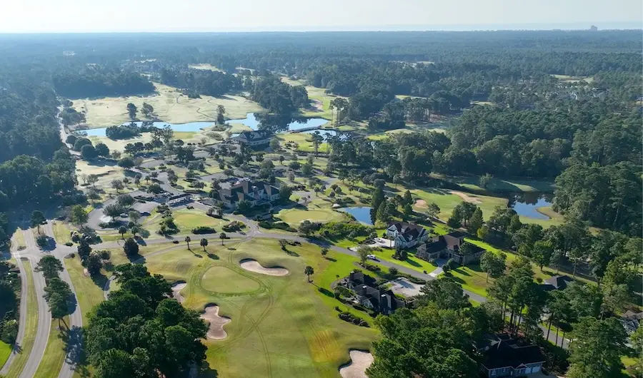 Lion's Paw from the air with its lakes, bunkers and clubhouse set among the pines