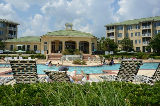 The outdoor pool and sun deck beside the villas at Barefoot Resort