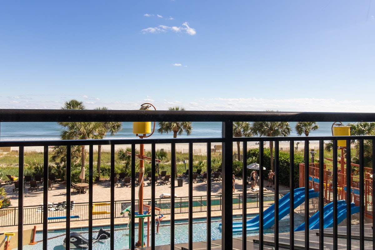 The view from a balcony at Breakers Resort, over the pool deck to the ocean