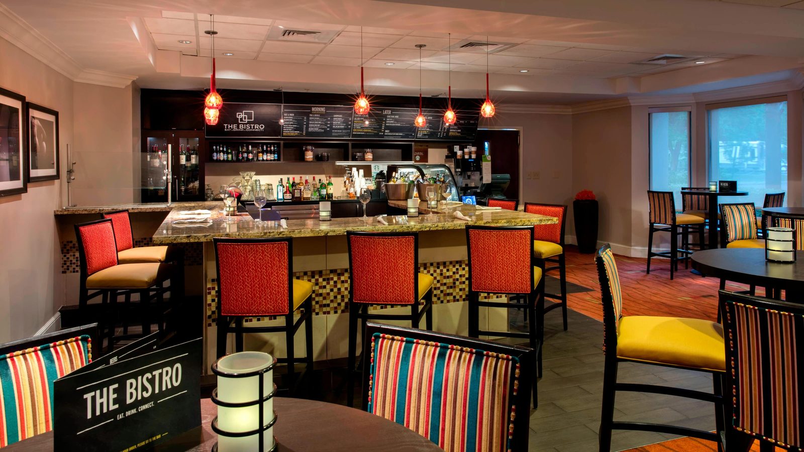 The Bistro bar and cafe seating in the lobby at the Courtyard by Marriott
