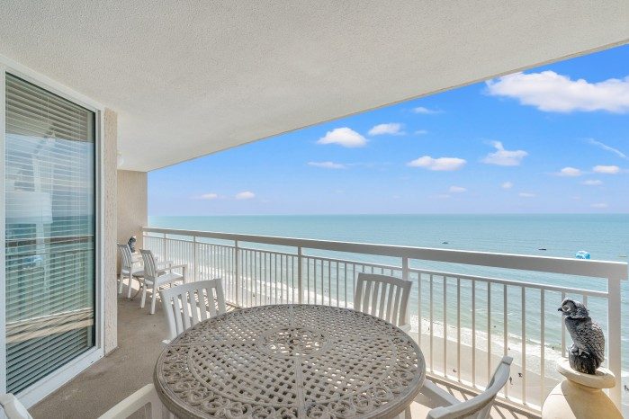 The ocean and the beach from a condo balcony at Crescent Shores