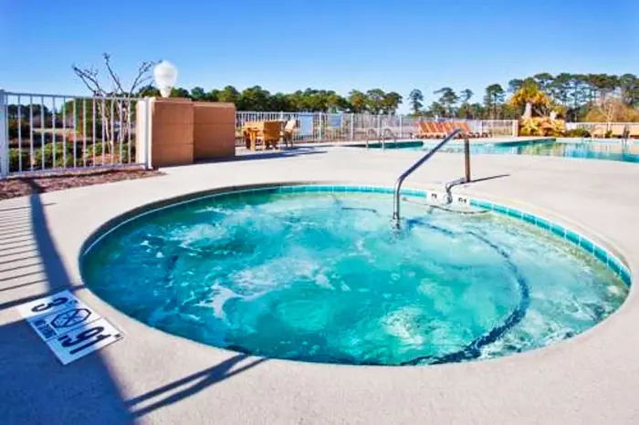 The outdoor hot tub on the pool deck at the Holiday Inn Express