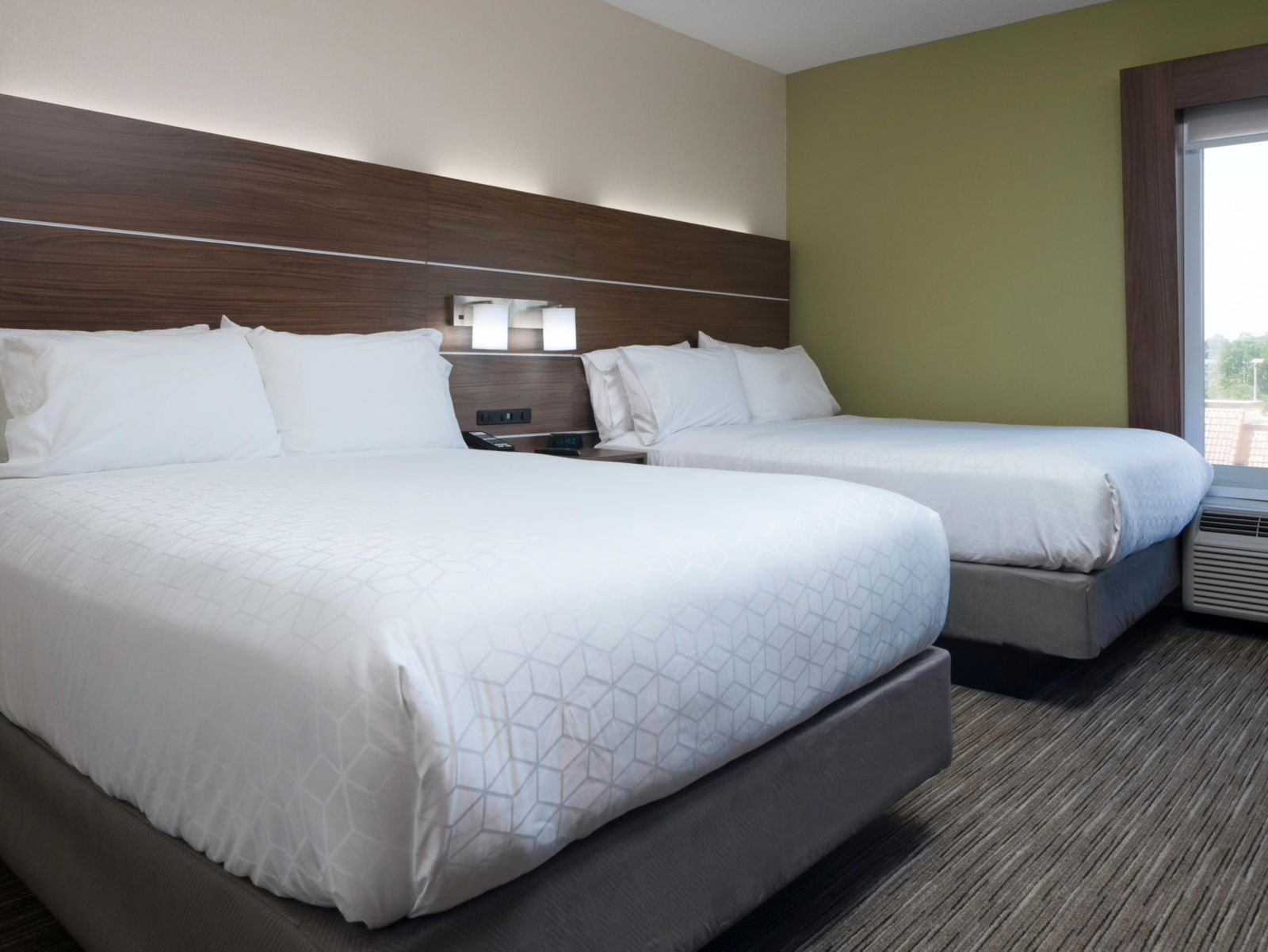 Guest room with two queen beds at the Holiday Inn Express in Little River