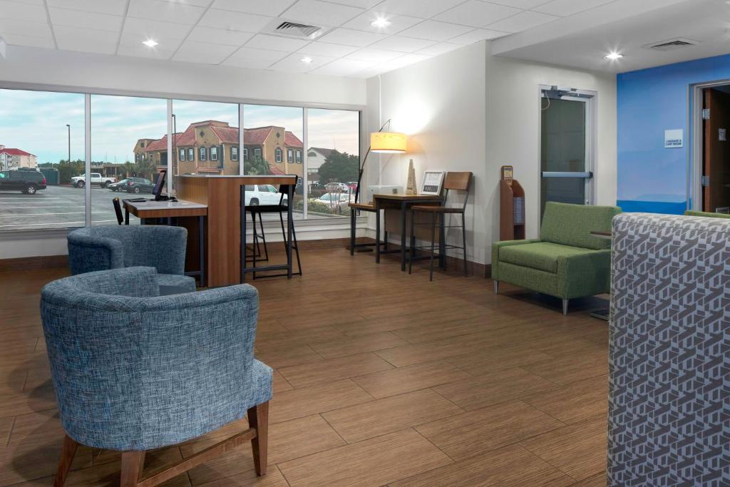 Seating and the front desk in the lobby at the Holiday Inn Express in Little River