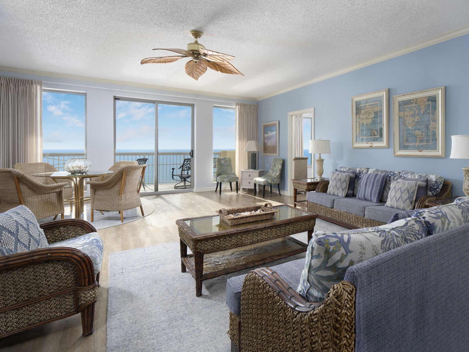 Living area of an oceanfront condo at Margate Tower, with sliding doors onto the balcony