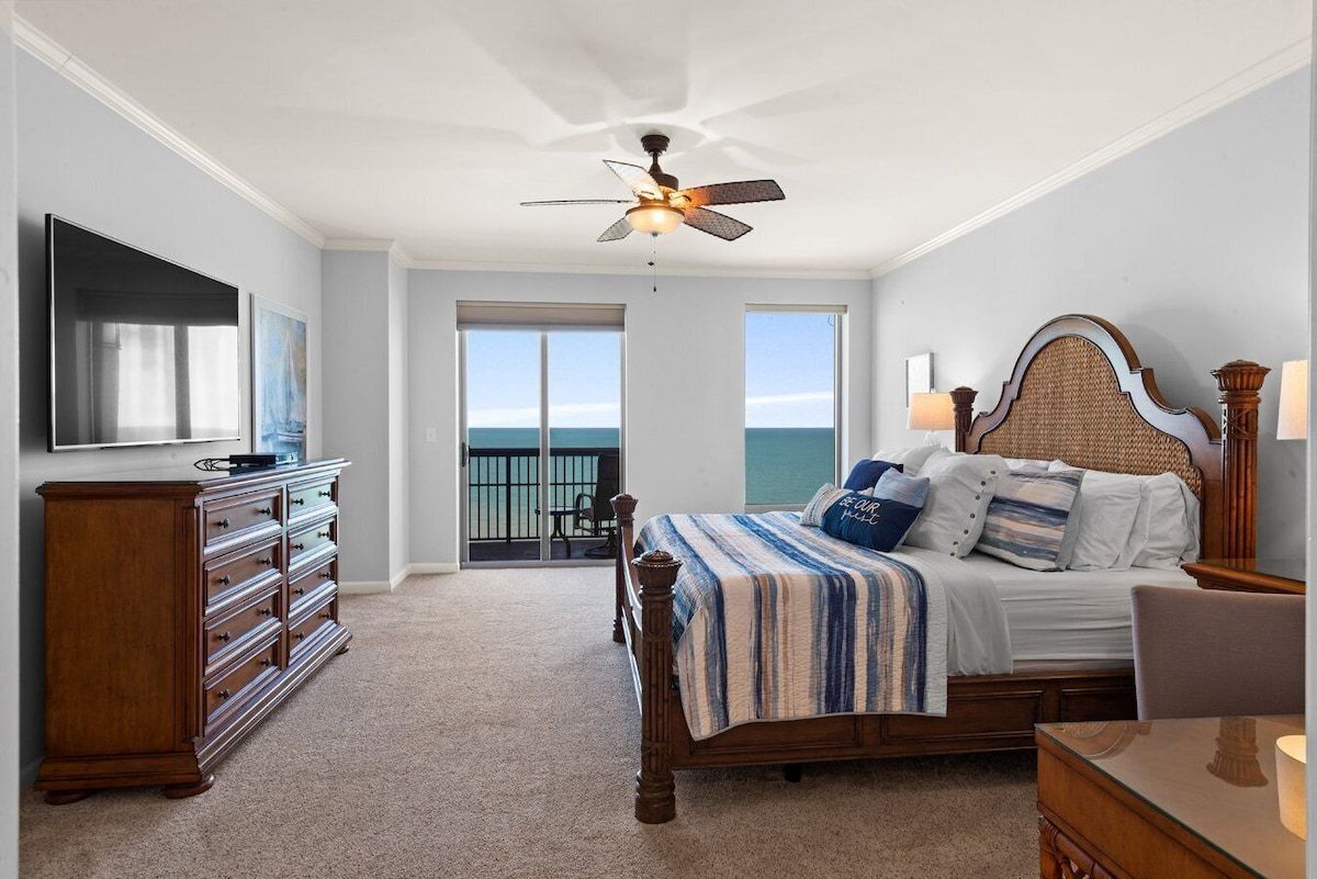 Oceanfront bedroom at Margate Tower, with a king bed and doors onto the balcony