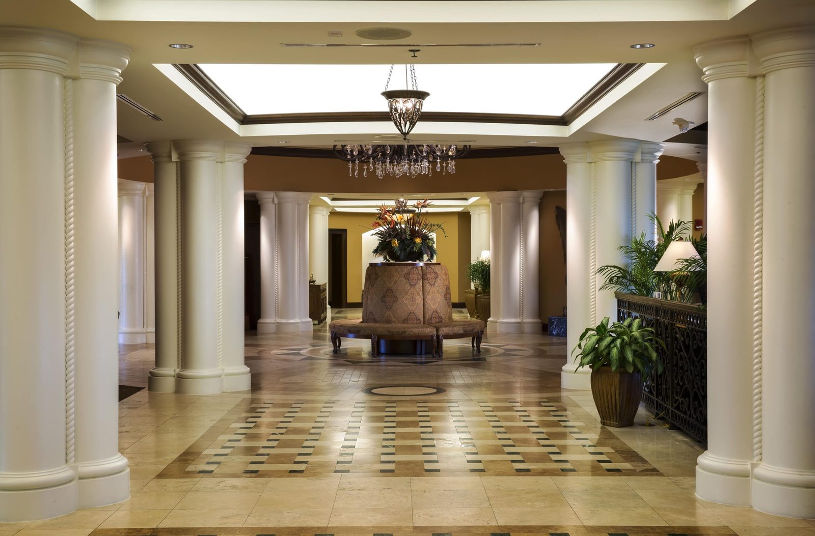 Seating and the staircase in the lobby at the Marina Inn at Grande Dunes