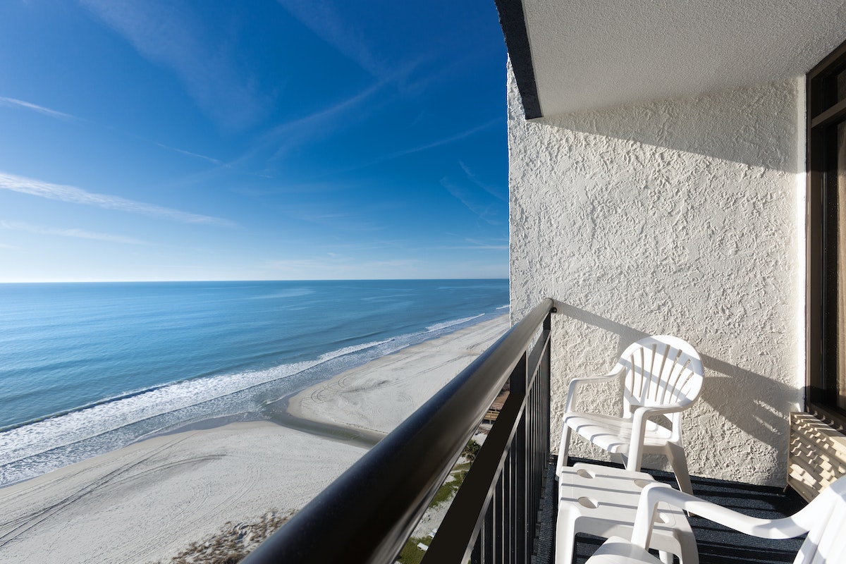 The beach and the ocean from a suite balcony at Monterey Bay Suites