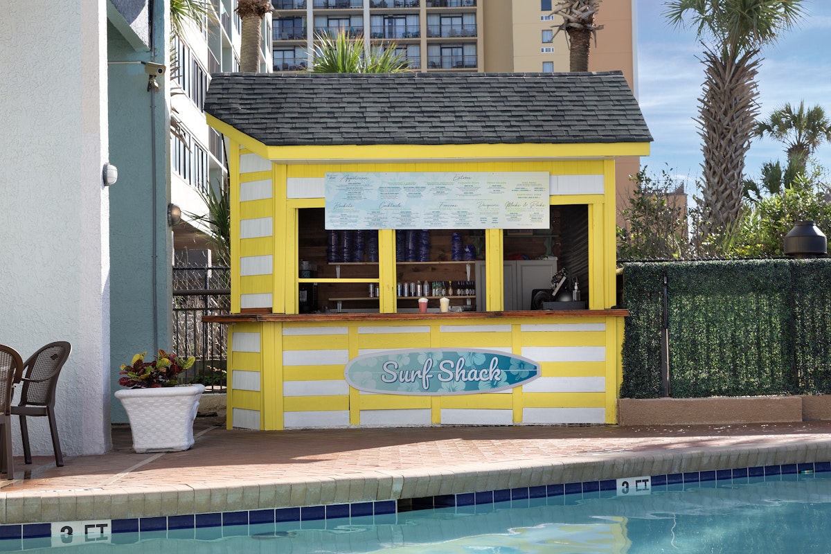 The Surf Shack bar beside the pool at Monterey Bay Suites