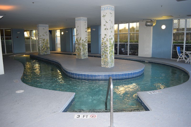 The indoor lazy river and pool at Ocean Blue Resort