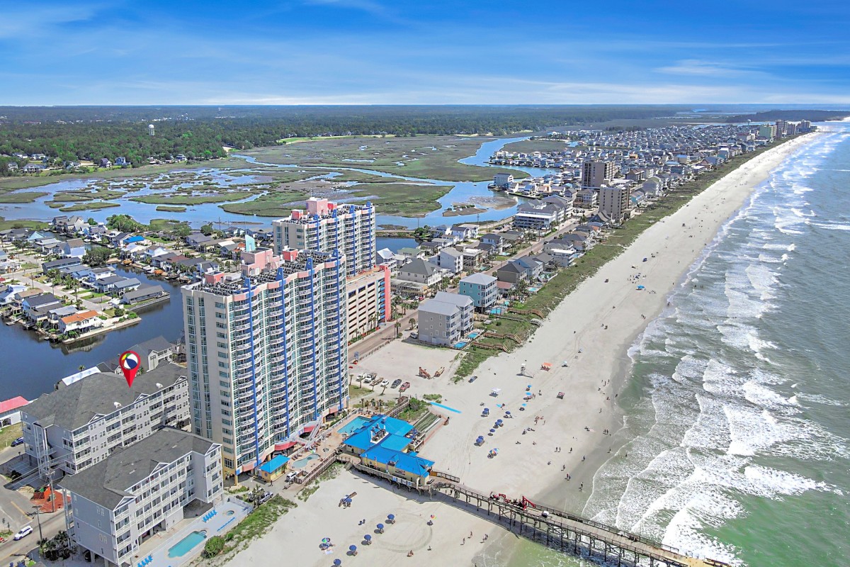 Pier Watch Villas from the air, between the beach at Cherry Grove Pier and the marsh channels behind