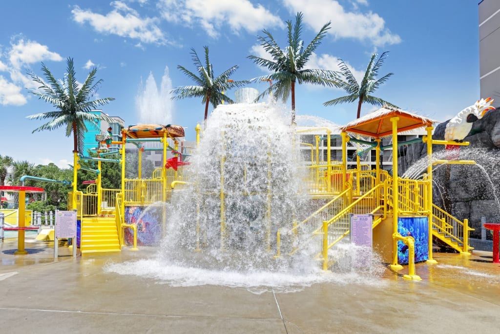 The water park play structure and its tipping bucket at Sand Dunes Resort
