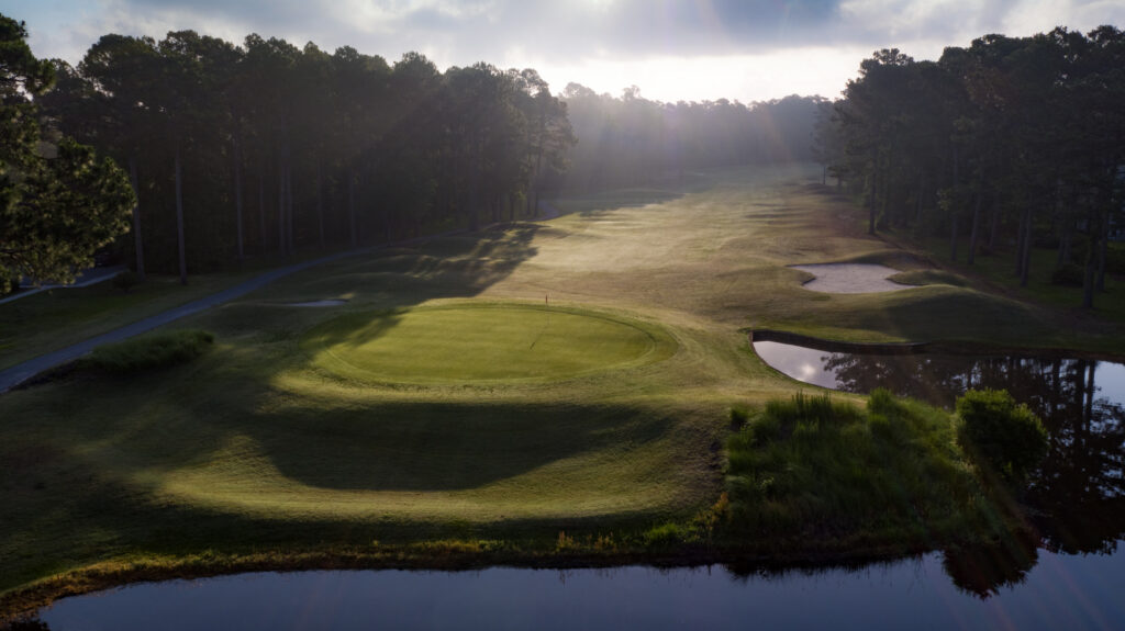 A green on the Jones course at Sea Trail, with water running along both sides