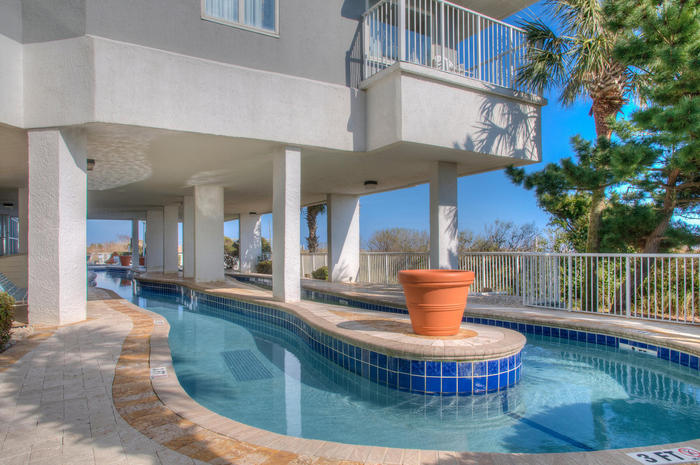The lazy river running under the building at Sea Watch Resort