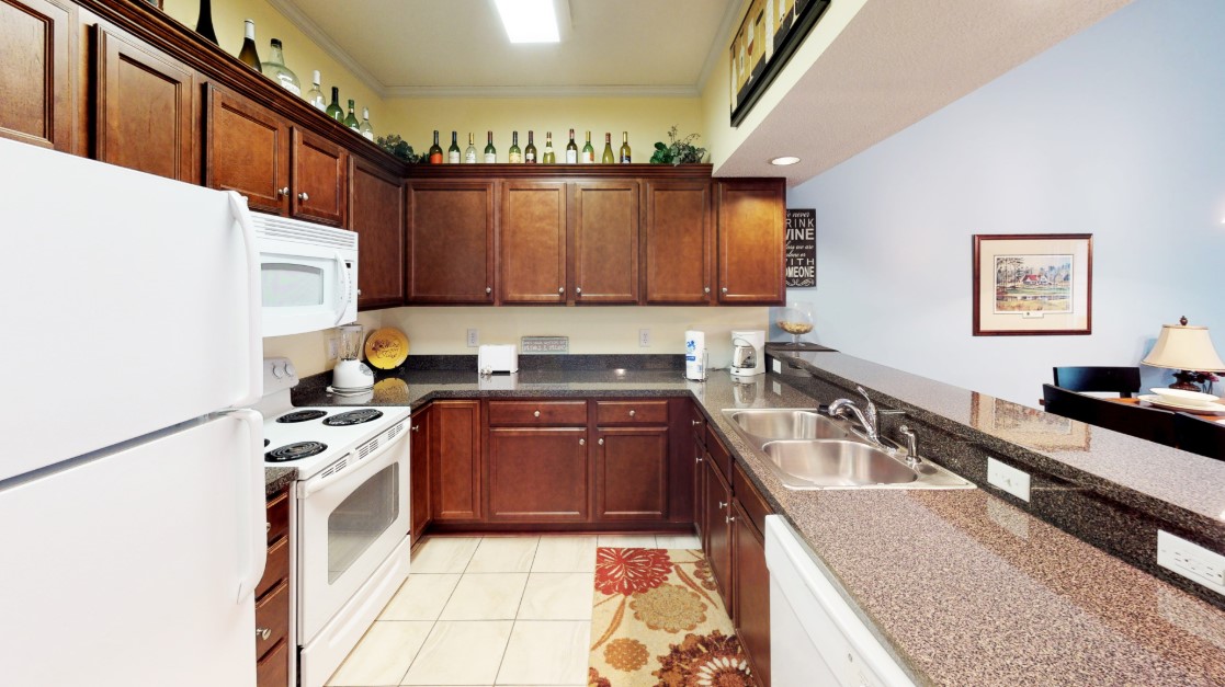 Villa kitchen at Village at the Glens with granite counters and a breakfast bar
