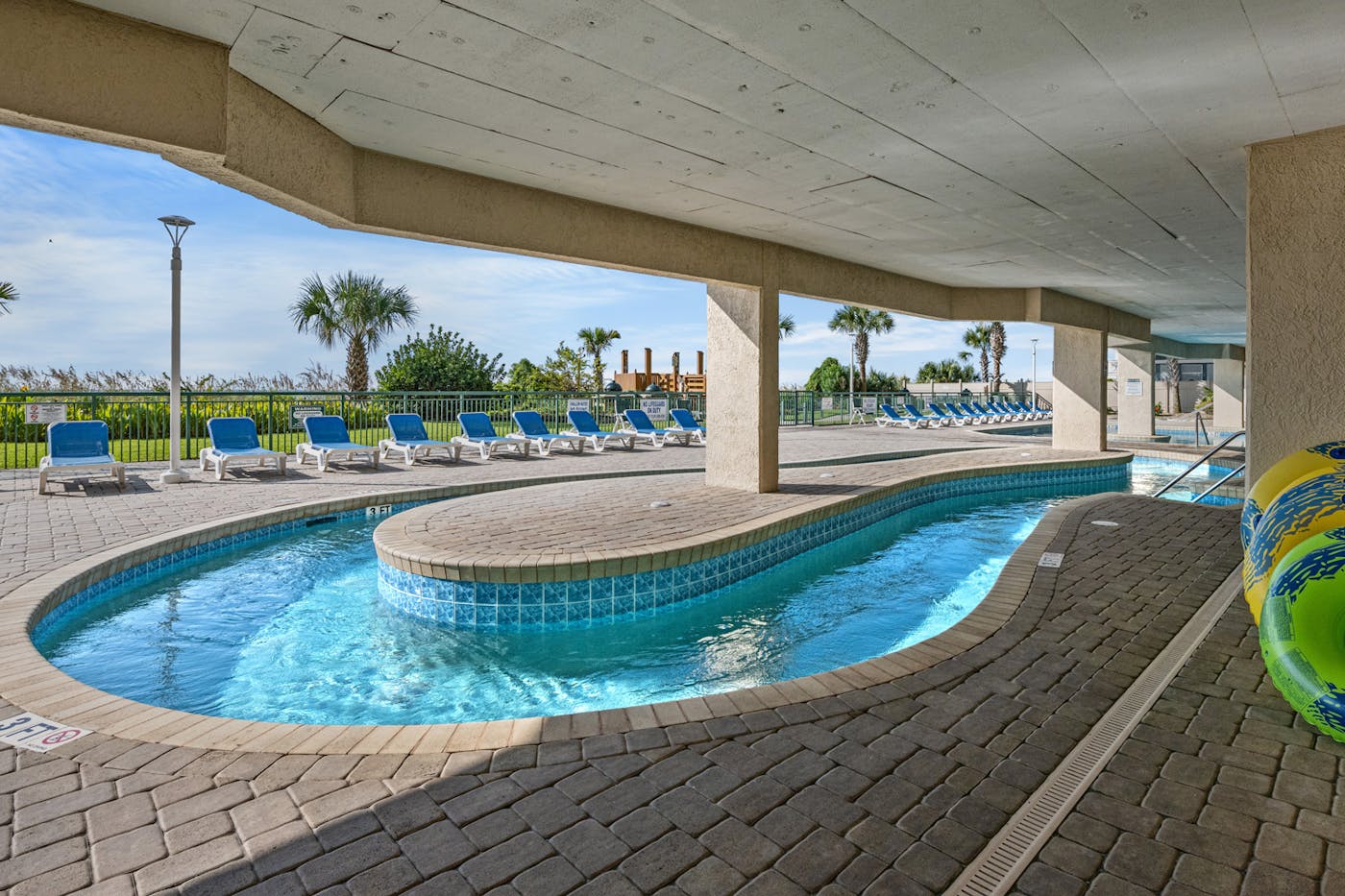 The lazy river running under the building at Windy Hill Dunes