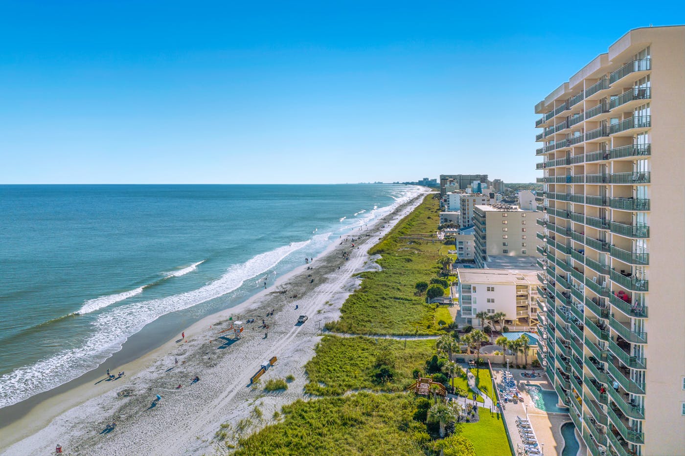 The beach and the dunes below the balconies at Windy Hill Dunes
